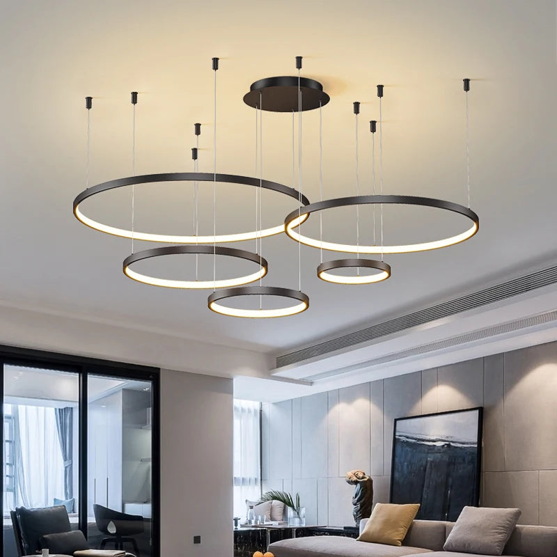 Stacked acrylic ring chandelier with graduated rings in a tapering column
