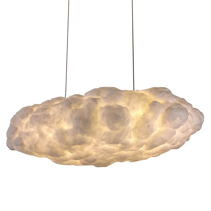 Moulded space cotton shade concealing the wrought iron chandelier frame