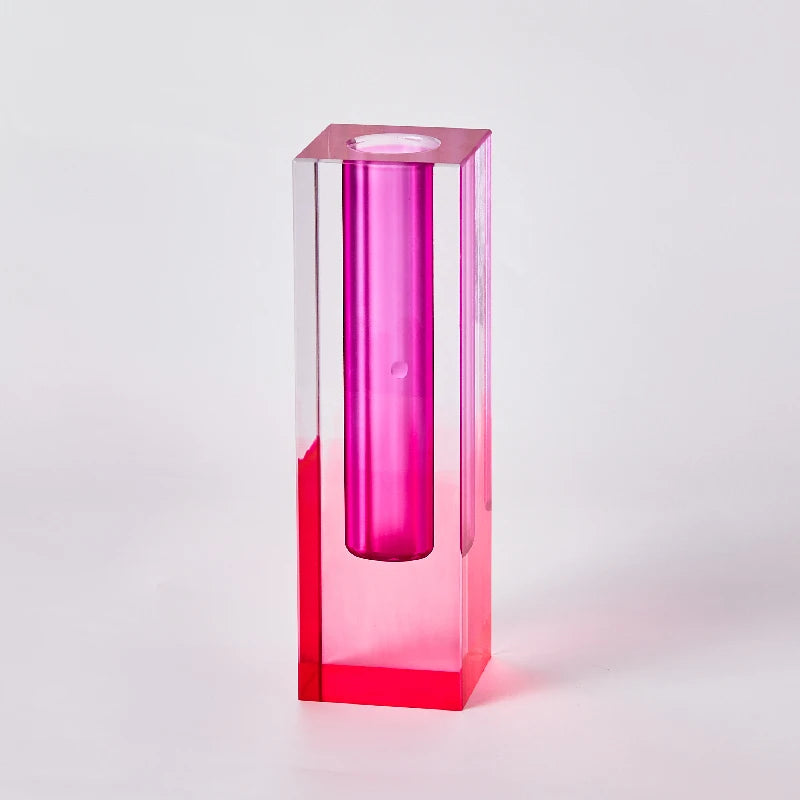 Frosted acrylic pillar vase duo paired with books and ceramic bowl on shelf