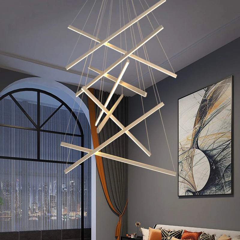 Nordic cascading chandelier with slim metal pendants on adjustable white cords