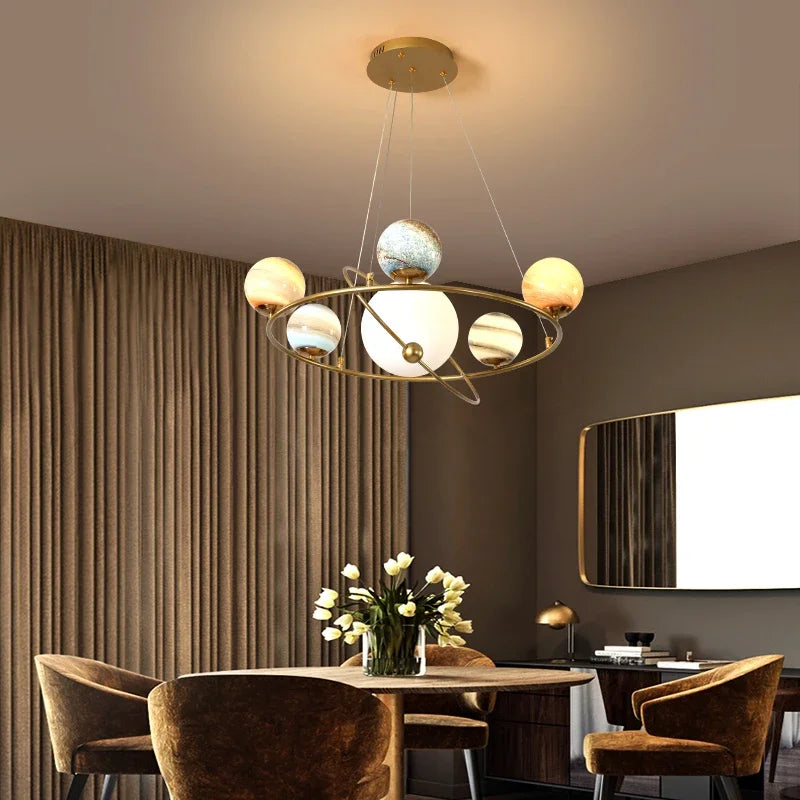 Thirteen head planet globe chandelier with a wide plated metal spread