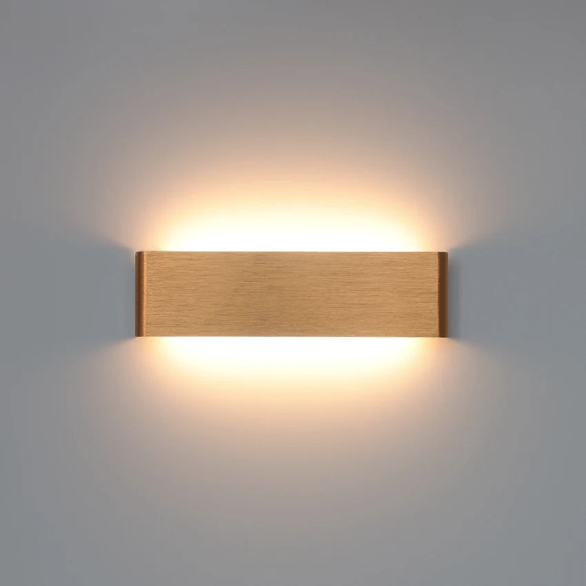 gold aluminum wall sconce, side profile showing mounting depth