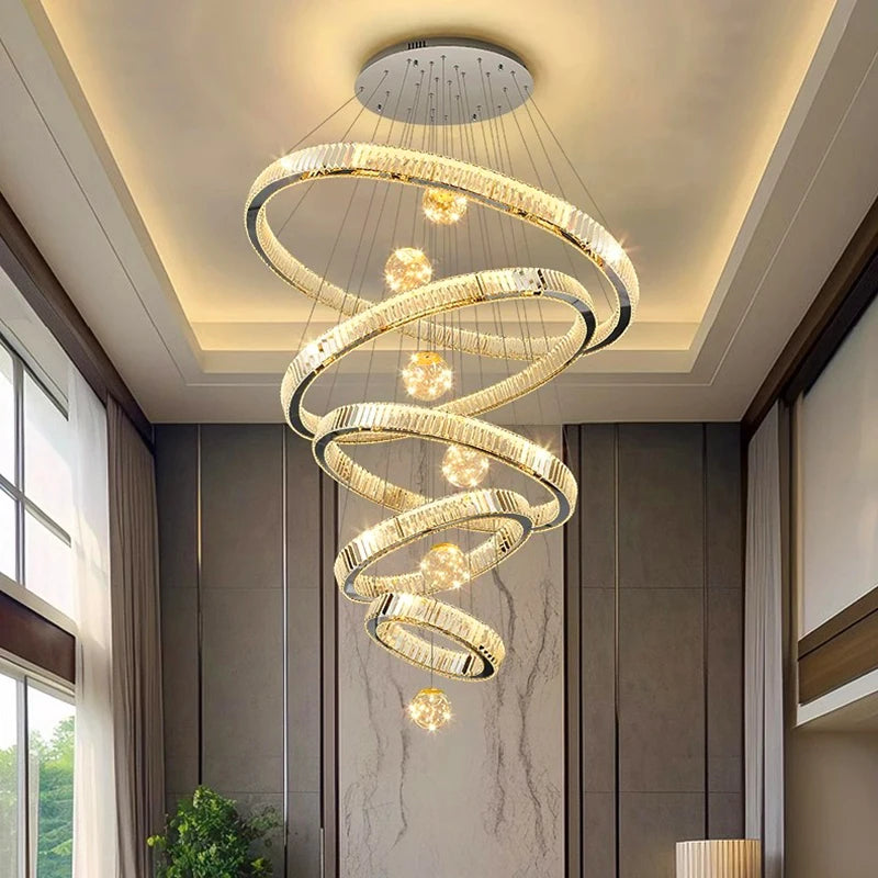 Eight ring crystal chandelier in a gold gilded stainless steel finish