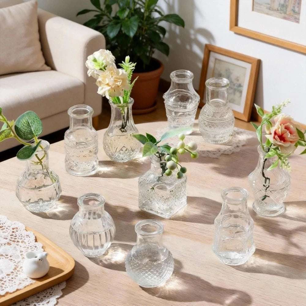 Ten amber embossed glass mini vases styled as party centerpiece display