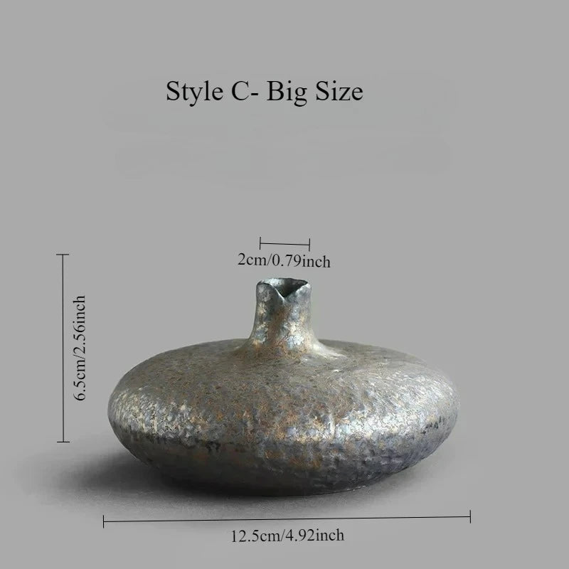 Flat lay of all crude pottery kiln vase styles on natural linen surface