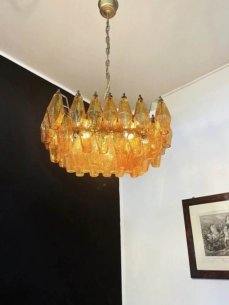Amber glass cluster chandelier with rounded shades on polished steel arms