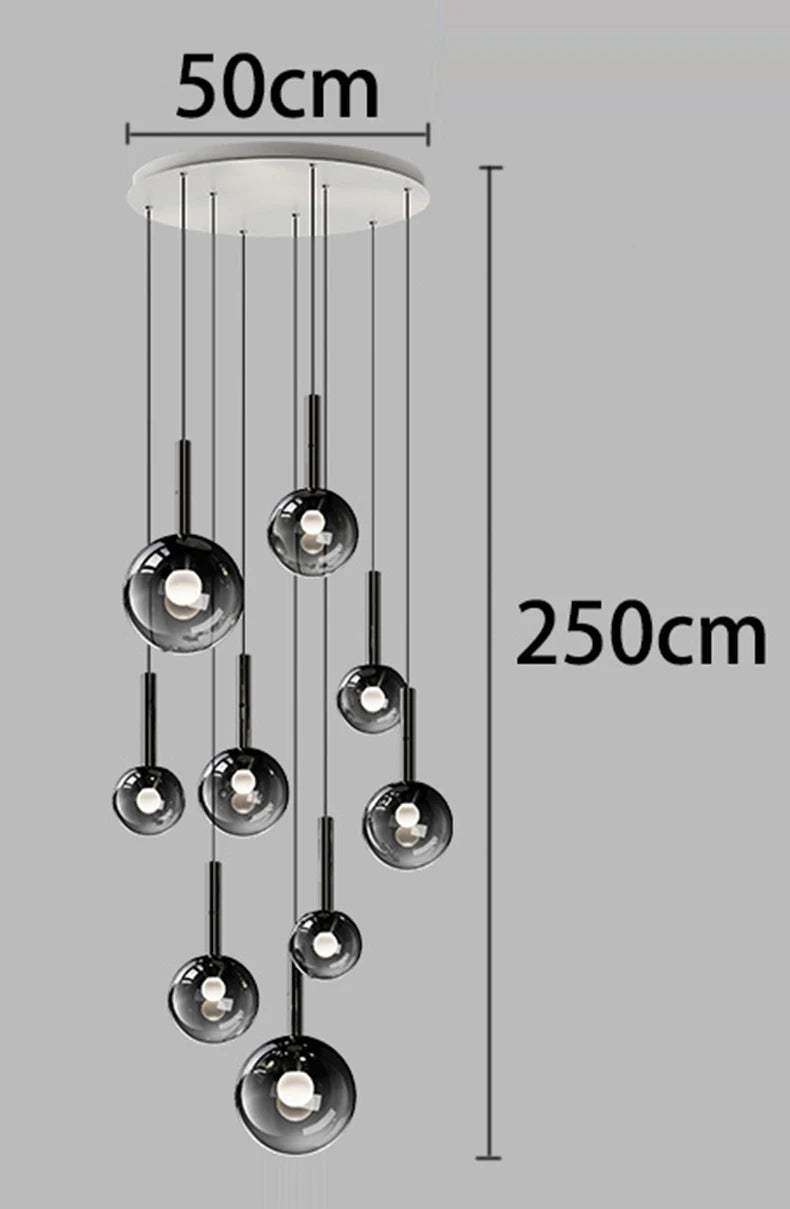 Staircase chandelier with individually suspended faceted glass elements
