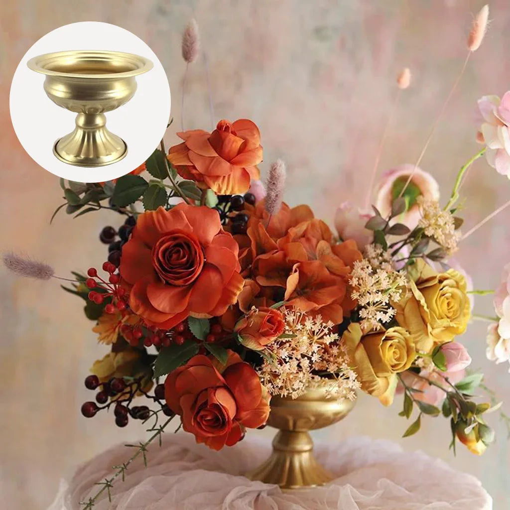 White metal vase candle holder as elegant formal dining table centrepiece