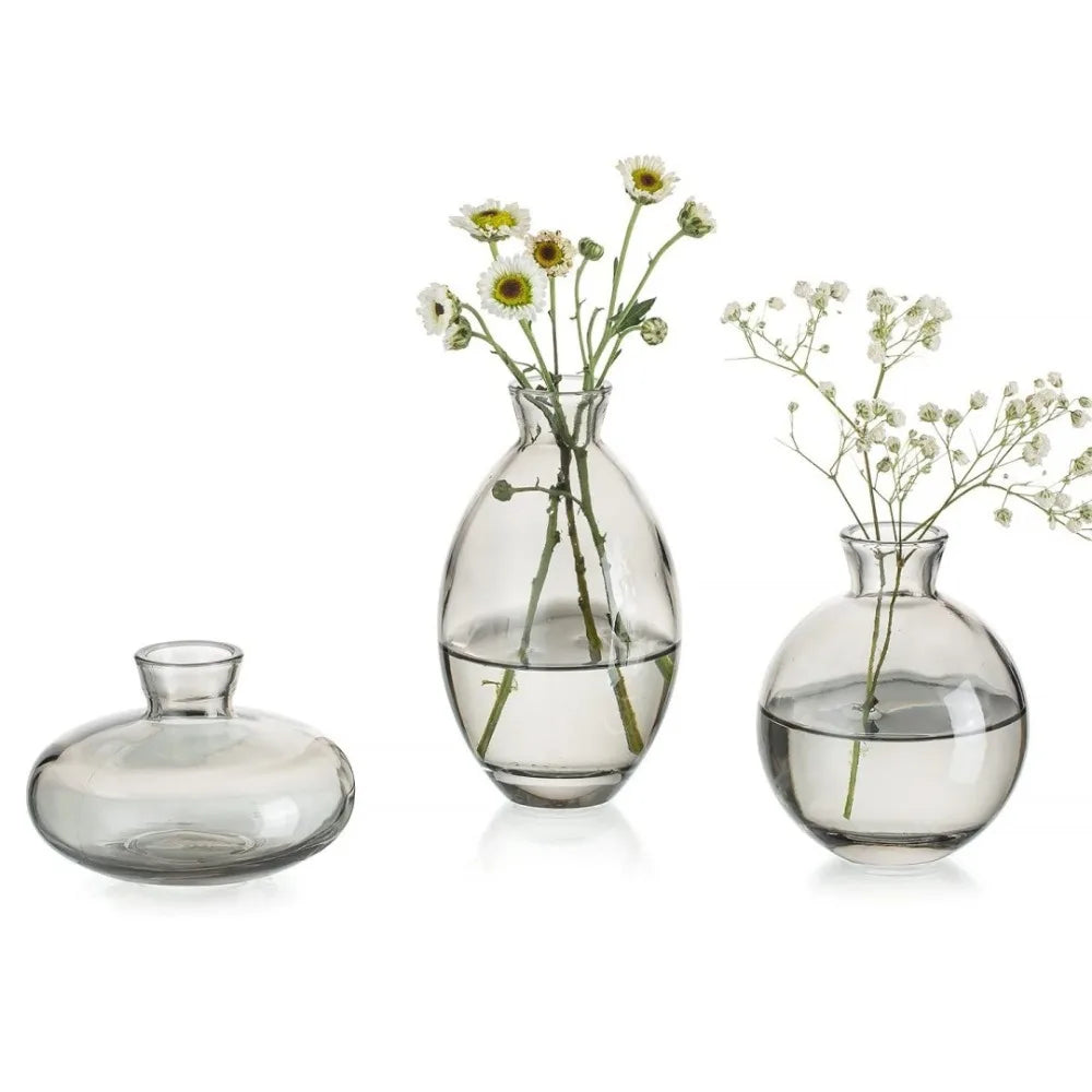 Grey A style mini glass vase with dried botanical stem on desk