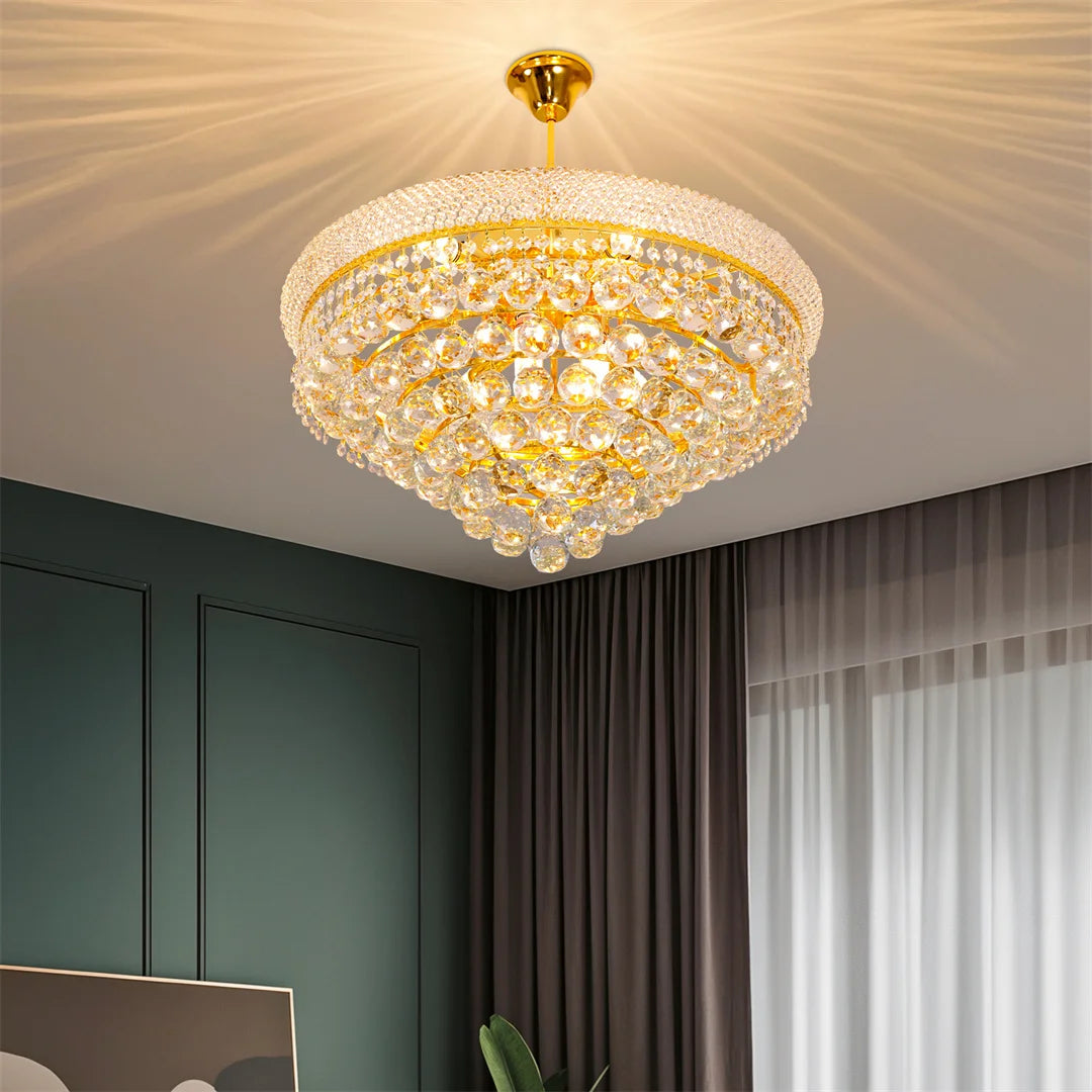 Oval crystal chandelier, 24.0 by 45.5 in, with nine E14 corn bulbs