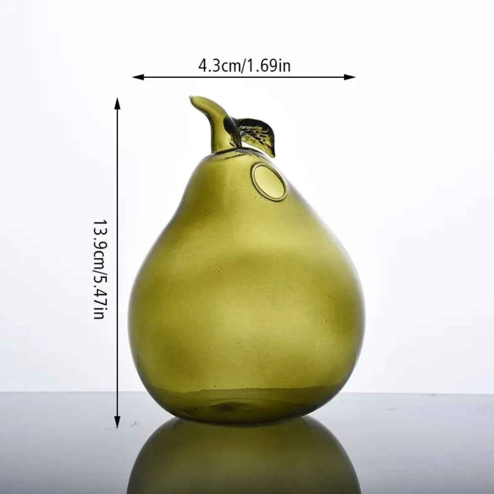 Glass fruit bud vase used as aromatherapy bottle on bathroom shelf