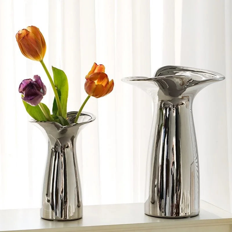 Large electroplated wabi-sabi vase in textured metallic finish on Japandi floating shelf