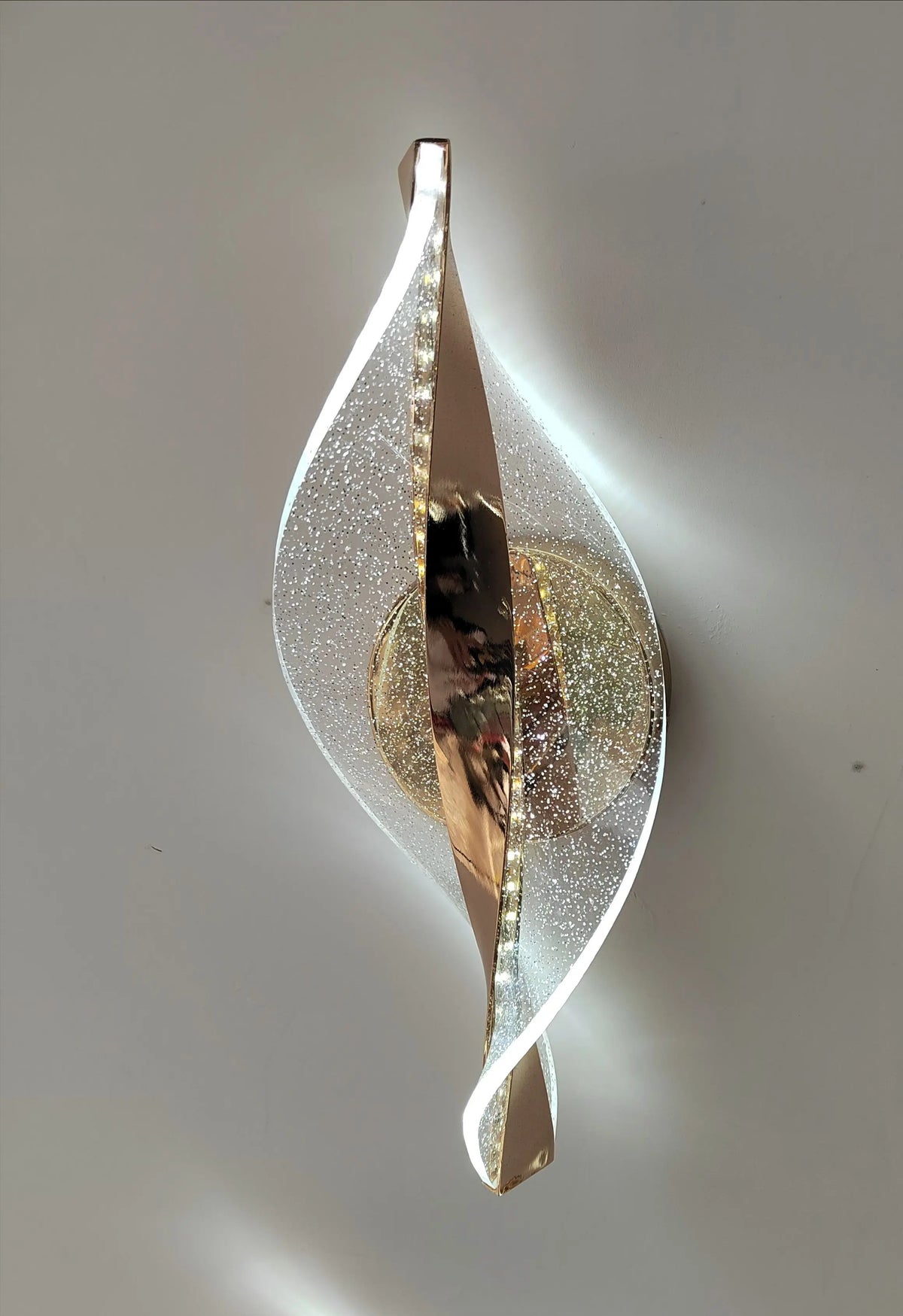 Twenty five light spiral glass chandelier for a tall stair void