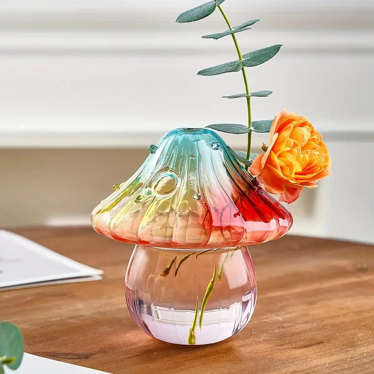Close-up of handcrafted glass texture on colorful mushroom cylinder vase