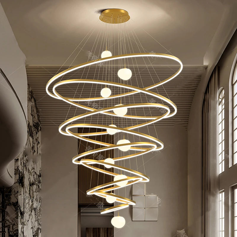 Four ring chandelier in gold with rings to 39.4 inches and a 98.4 inch drop