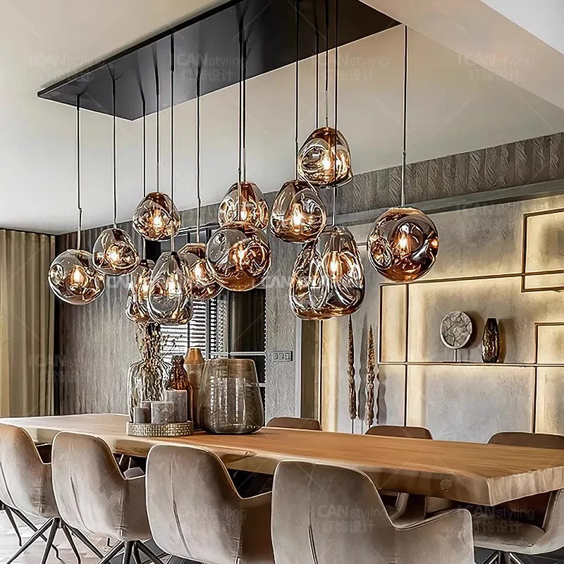Brushed steel glass chandelier with glass shades on an iron frame