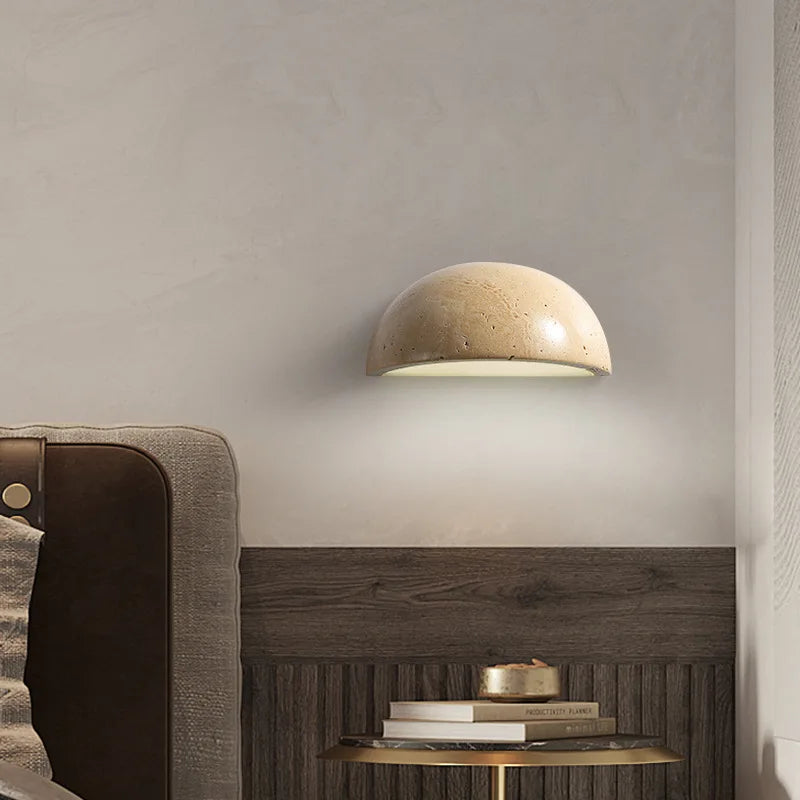 stone wall sconce, installed in a room interior setting