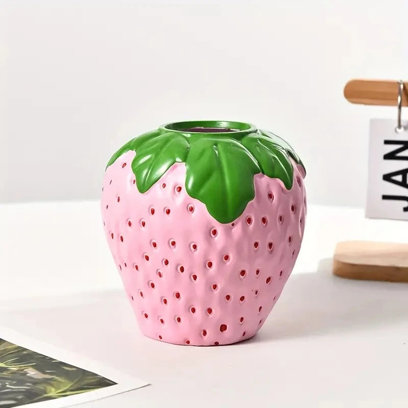 Ceramic strawberry vase used as vintage-inspired cottage room accent