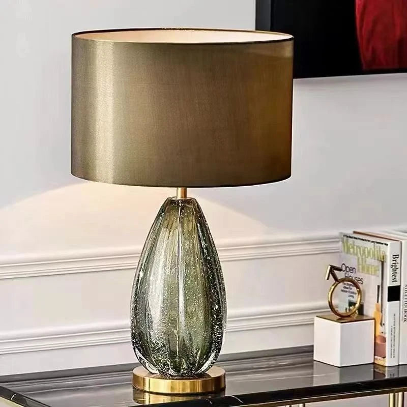 Modern glass table lamp B style on bedroom nightstand close-up view