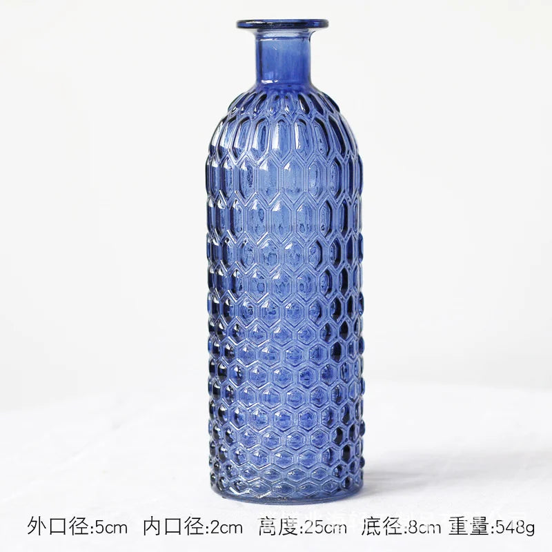 Blue glass terrarium flower vase from above showing round opening detail