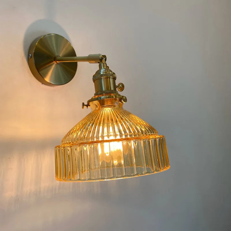 green glass bathroom wall sconce, close-up of shade and hardware detail