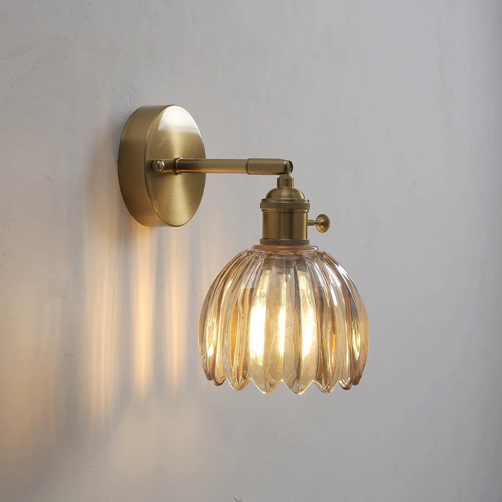 green glass wall sconce, installed in a room interior setting
