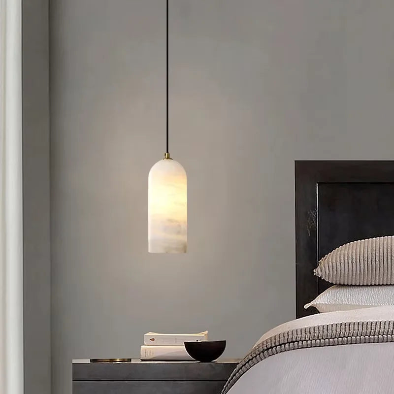Marble shade chandelier on a plated gold stem and cord