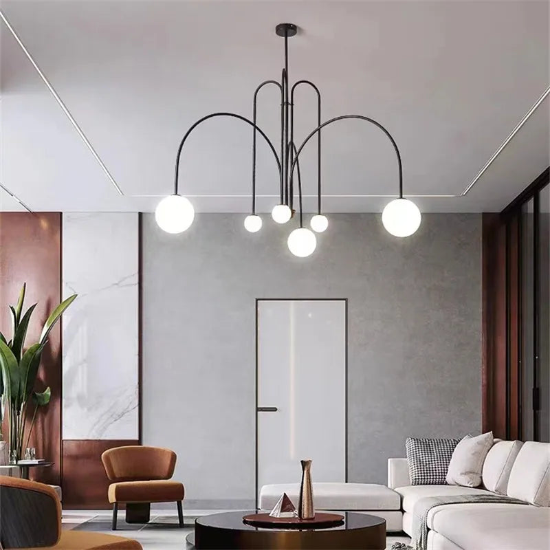 Black arched chandelier at 35.4 in wide with frosted glass globes