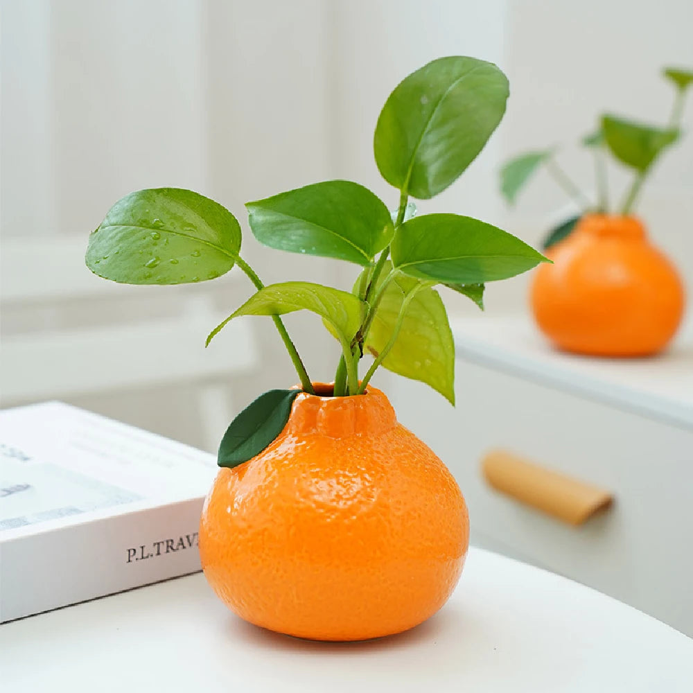 Close-up of smooth glaze on ceramic fruit shape table vase detail