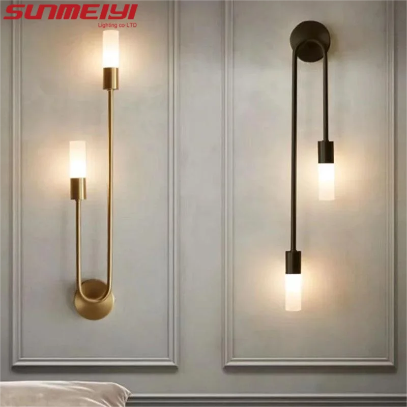gold wall sconce, front view on white background