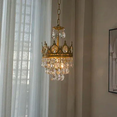 Crystal and iron crown detail on the retro French chandelier