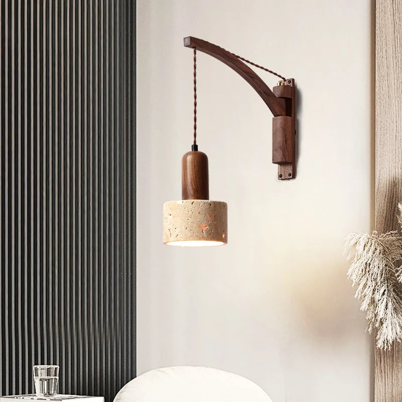 travertine stone wall sconce, installed in a room interior setting