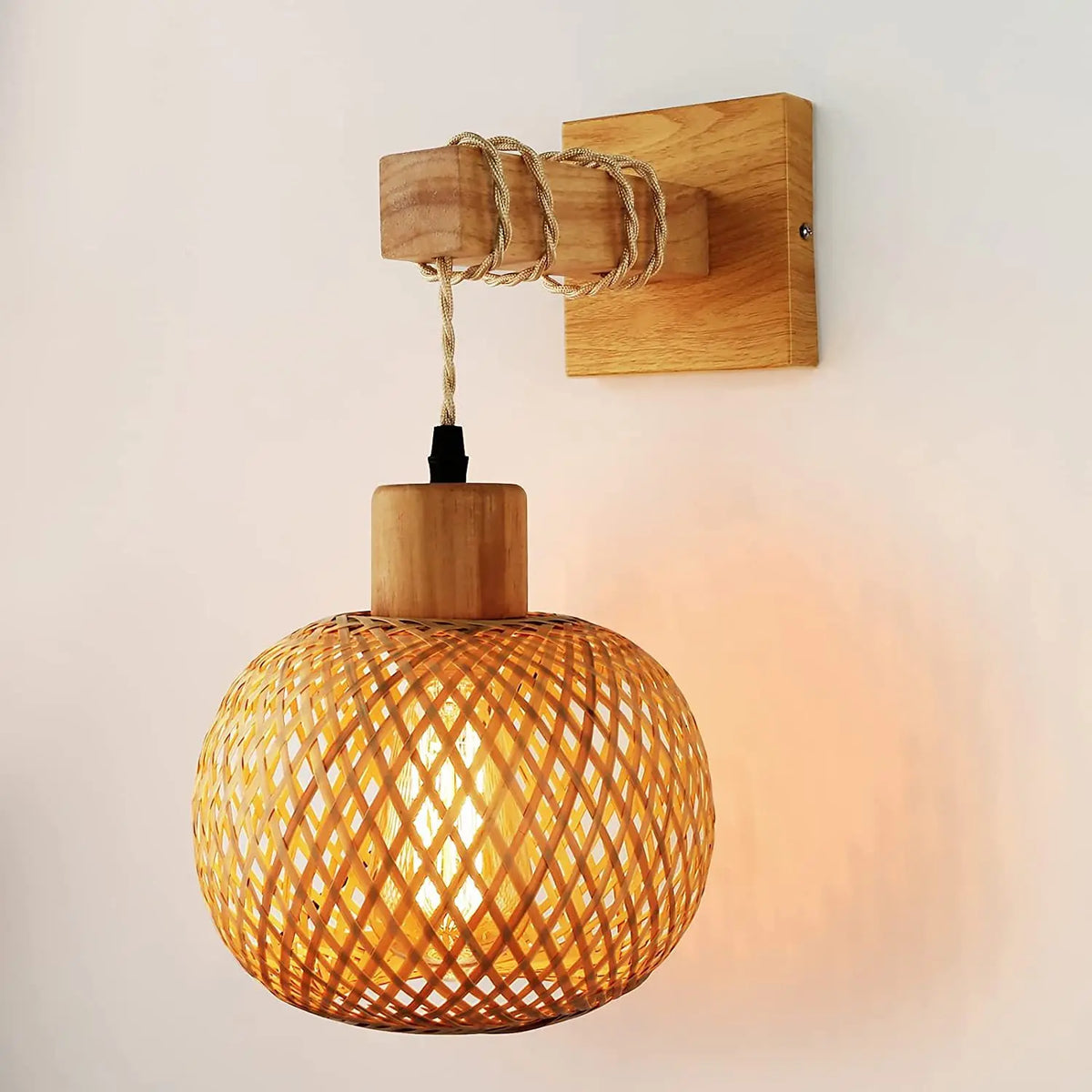 rattan wall sconce, front view on white background