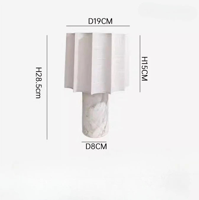 Natural marble table lamp switched off showing stone texture in daylight