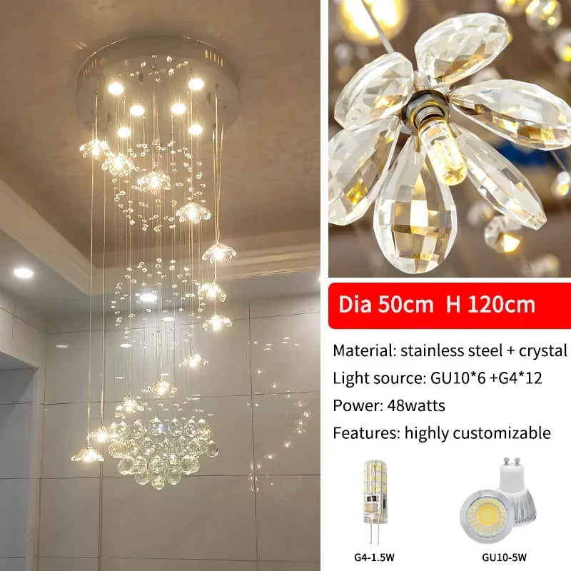 Crystal flower chandelier shown lit in warm light down its full drop