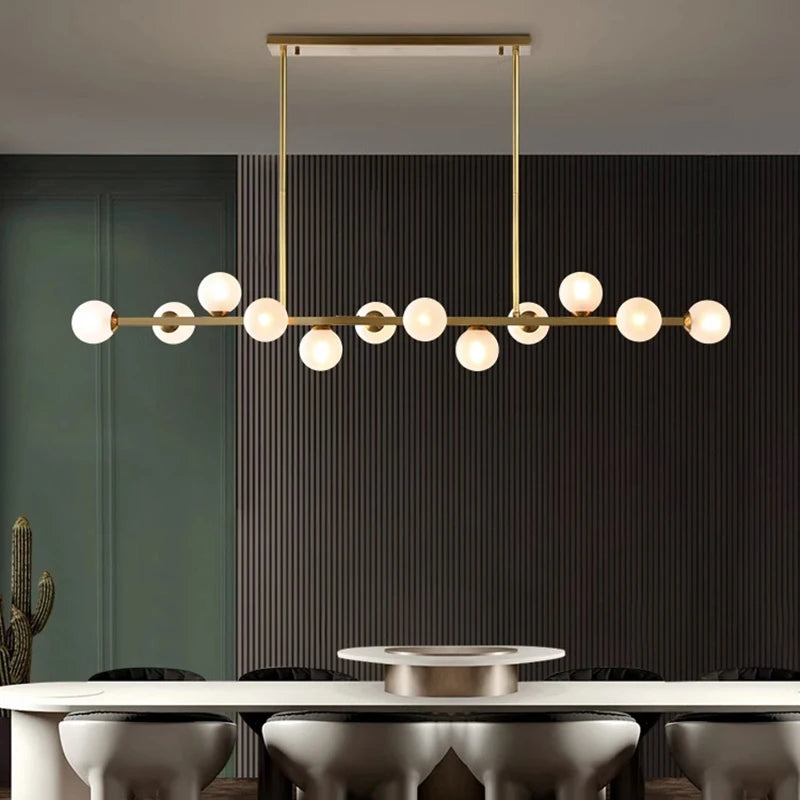Modern linear cluster chandelier with small lights on a slim iron bar