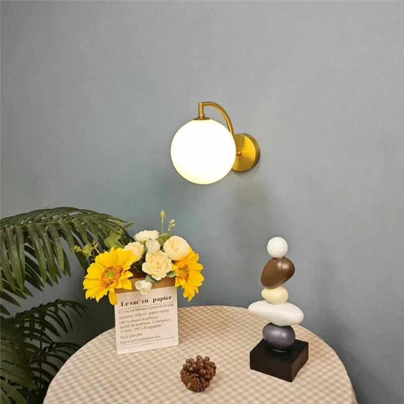 glass wall sconce, close-up of shade and hardware detail