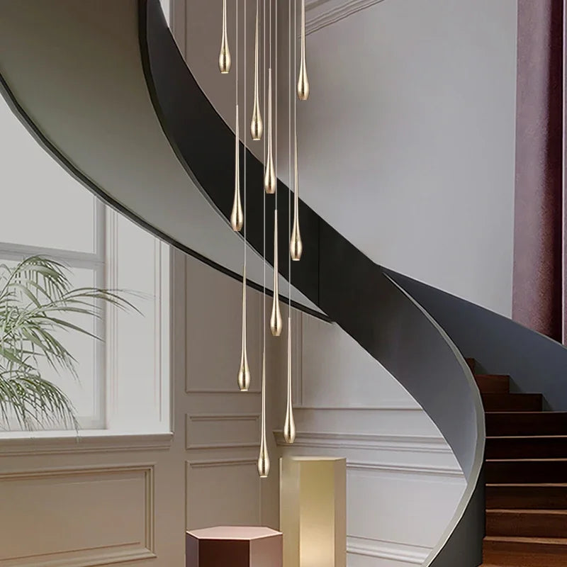 Spiral staircase chandelier in gilded aluminium with 25 lights