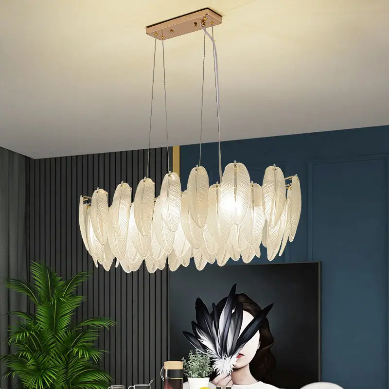 Six light feather glass chandelier measuring 23.6 in (60 cm) across