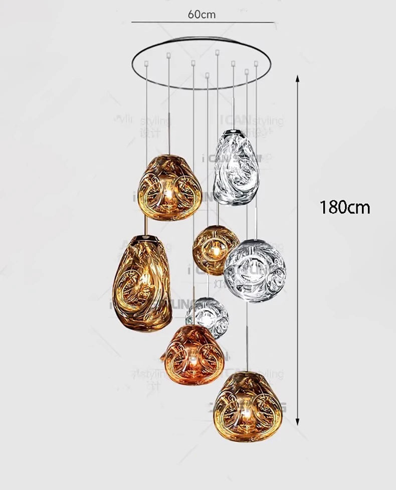 Glass heads hung at mixed lengths from a brushed steel chassis