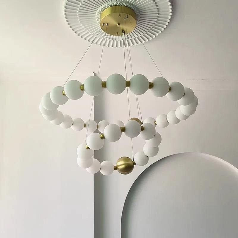 Acrylic ring glowing as a clean circle on a cord pendant
