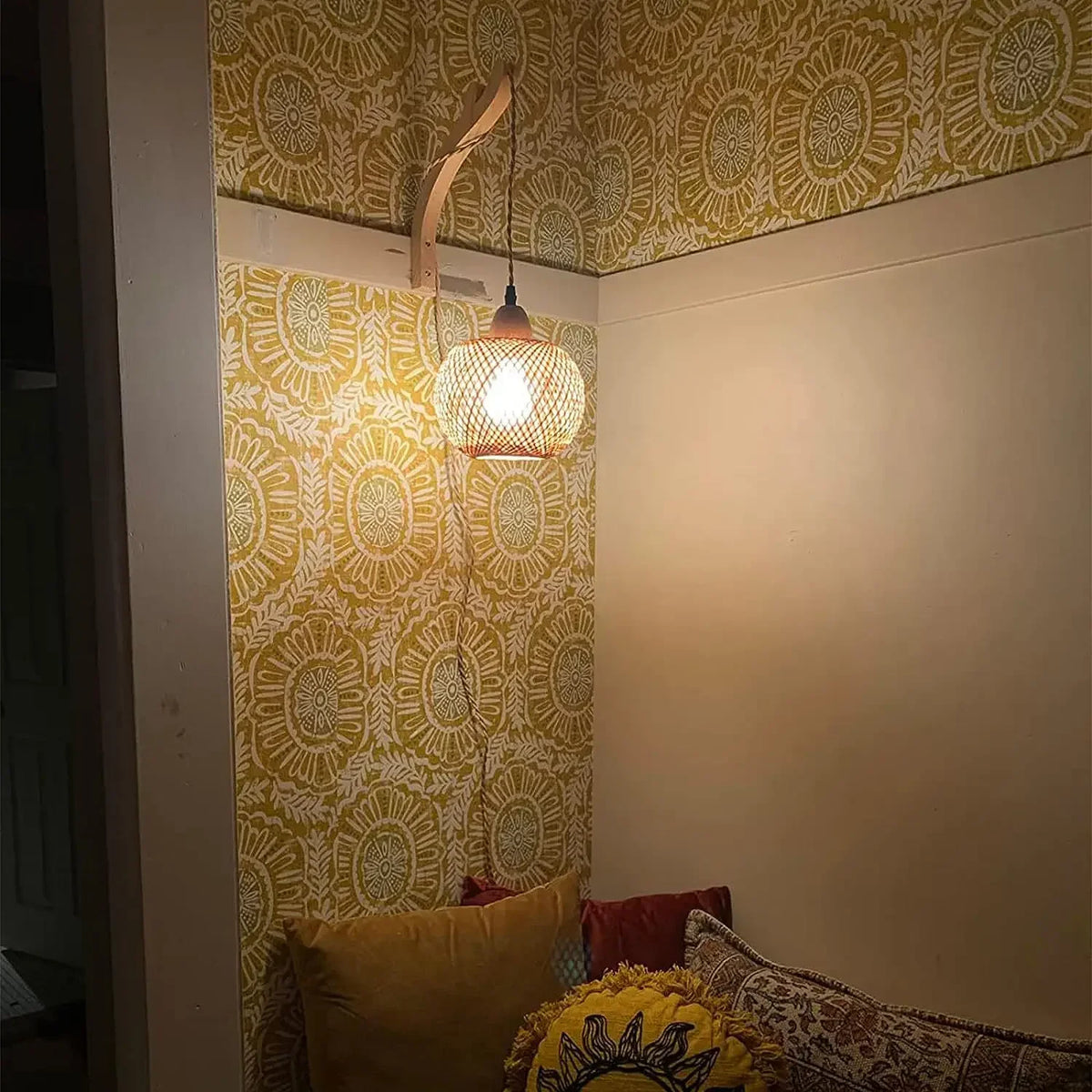 rattan wall sconce, side profile showing mounting depth