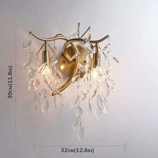 Crystal drop detail on a gold American branch ceiling chandelier