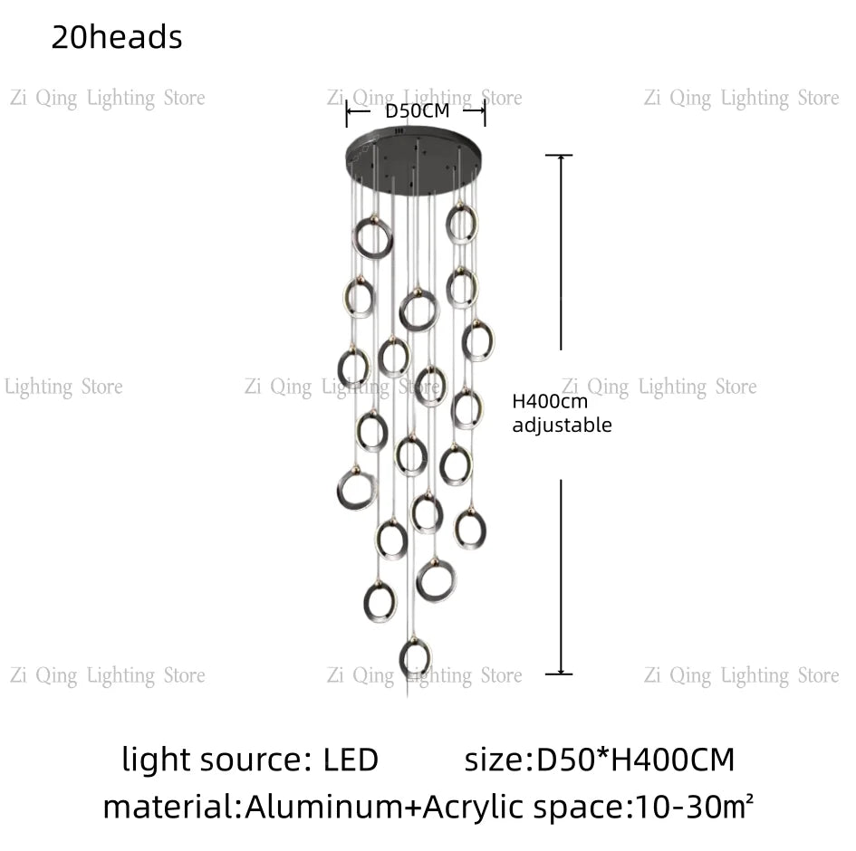 Twelve ring staircase chandelier suspended at staggered cord heights