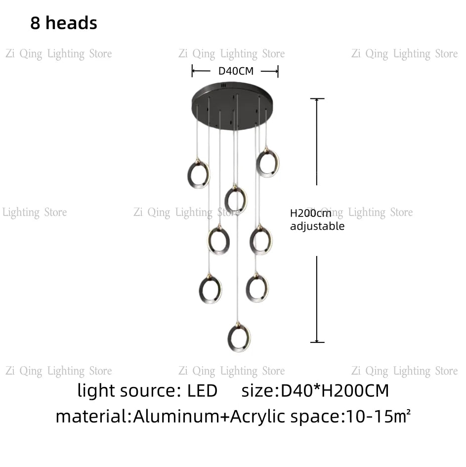 Aluminum ring chandelier with white light across its acrylic diffusers