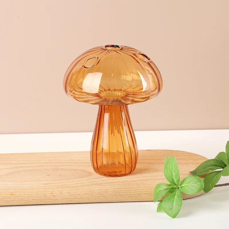 Three jelly color plastic vase styles displayed side by side on table