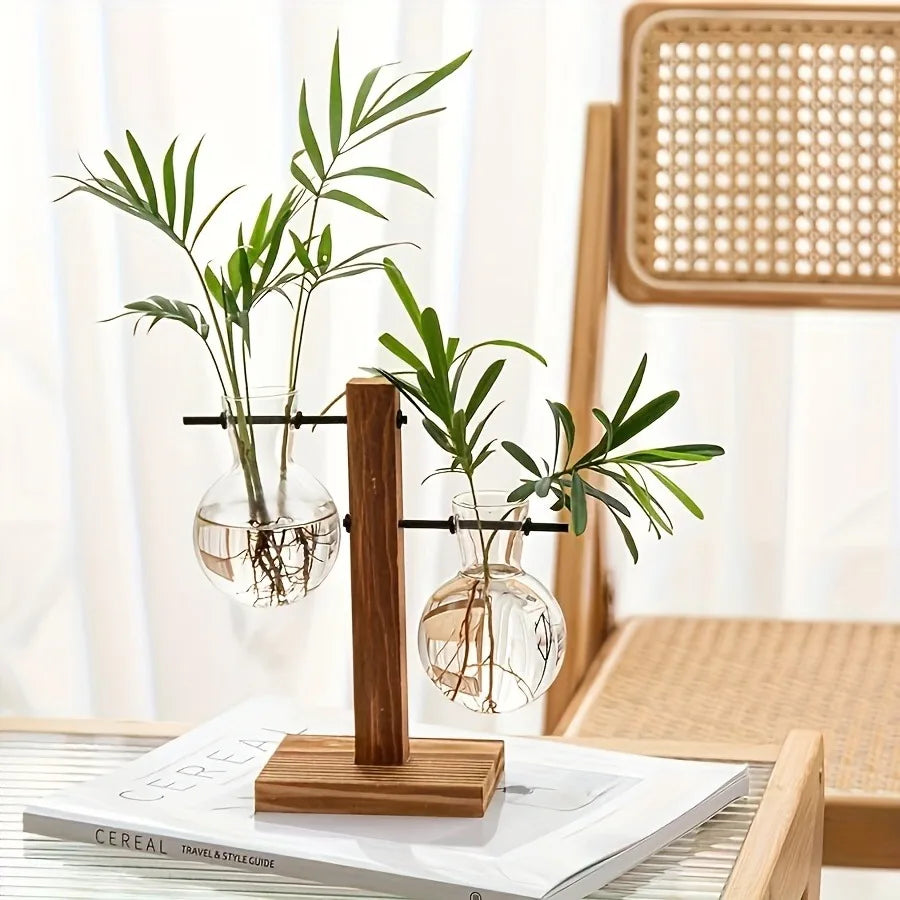 Brown glass retro vase with plant cuttings rooting in water on shelf