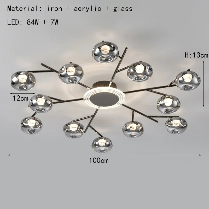 Nordic minimalist glass ball chandelier with a gold plated metal body