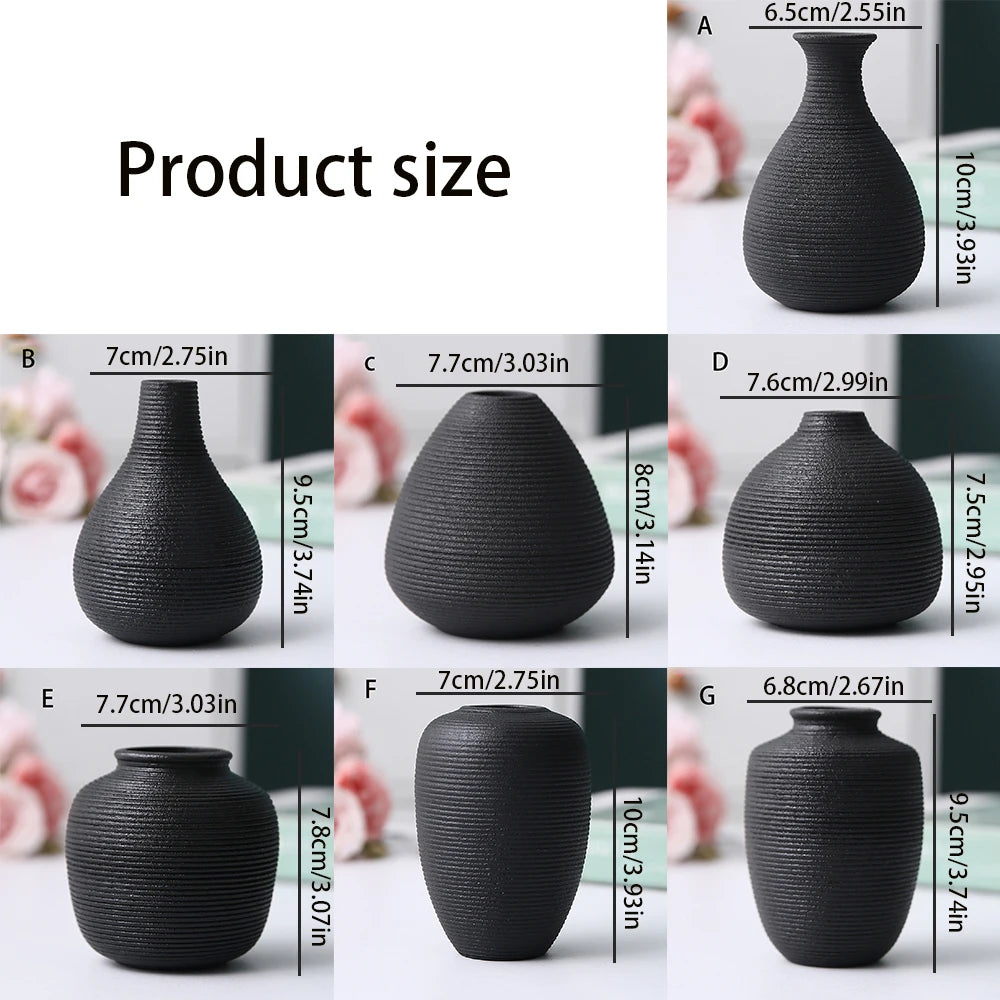 Black ceramic vase style D with angled asymmetric silhouette as Japandi decor accent