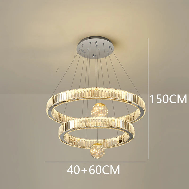 Crystal wrapped rings stacked on a brushed stainless chandelier frame
